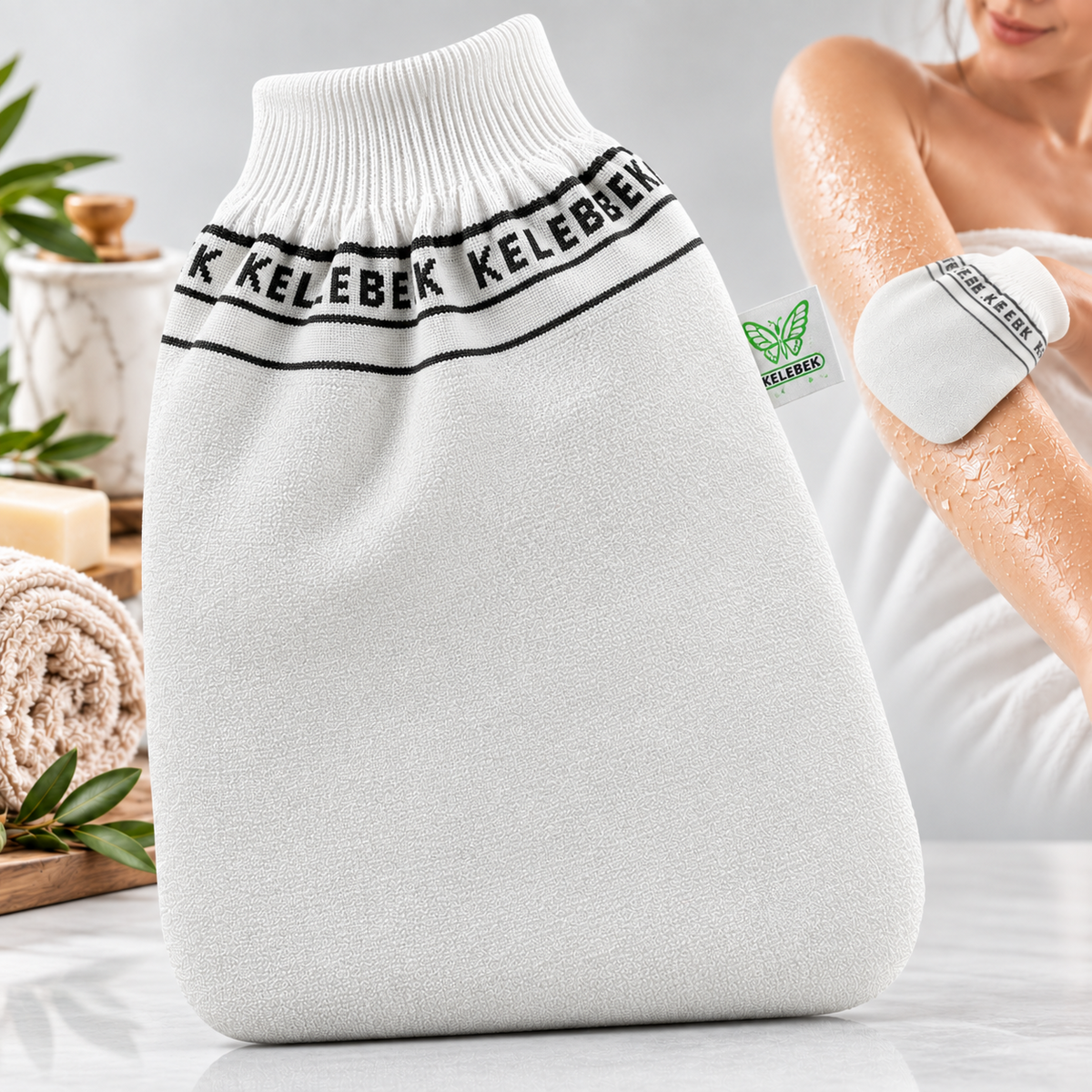 Mănușă exfoliantă turcească Kese, albă, subțire, model Kelebek, destinată exfolierii mecanice a pielii în baie sau hamam